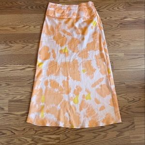 Free people midi skirt, size 6. Color pink, orange, hints of yellow.
